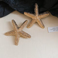 Textured Starfish Stud Earrings in Gold and Silver Tones view 6