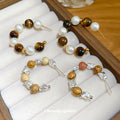 Brown And White Beaded Hoop Earrings In Two Patterns view 1