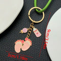 Eight Pink and Blue Baby Bottle Footprint Keychain Designs view 7