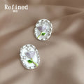 Clear Oval Dome White Tulip And Green Stem Stud Earrings view 4