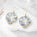 Gold Tone Abstract Face Pressed Flower Drop Earrings in Five Designs view 2