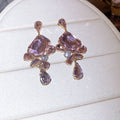 Faceted Crystal Floral Drop Stud Earrings with Polished Metal Tone Details view 7