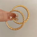 Gold Tone Braided Raised Texture Medium Hoop Earrings view 6