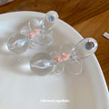 Clear Resin Flower Drop Earrings with Pink Beads and Sculpted Petals view 4