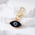 Gold Tone Druzy Style Hamsa Evil Eye and Pressed Flower Clip Keychains view 2