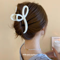 Crossed Loop Acrylic Hair Claw In Pink Marbled Or Gray Black view 4