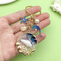 Starfish, Conch and Shell Charm Keychains Featuring Blue Shell Across 59 Variations view 2