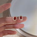 Gold Tone Clear Halo Red Oval Faceted Stone Stud Earrings view 4