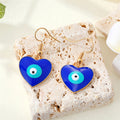 Gold Tone Blue Evil Eye Hook Earrings in Heart and Round Shapes view 4
