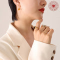 Gold Steel Crescent Bag Shape Textured Hoop Earrings view 3