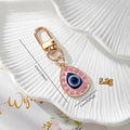 Gold Tone Rhinestone Evil Eye Heart and Teardrop Snap-Hook Keychains view 3