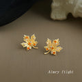 Gold Maple Leaf Stud Earrings With Amber And Clear CZ view 1