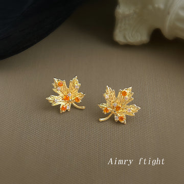 Gold Maple Leaf Stud Earrings With Amber And Clear CZ