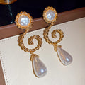 Gold Tone Spiral And Pearl Teardrop Stud Earrings With Crystals view 6