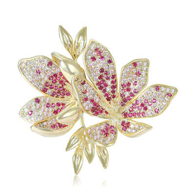 Magenta pave flower brooch front on white