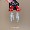 Red Horse Stud Earrings With White Beaded Chain Tassels view 1