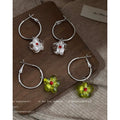 Silver Tone Round Hoop Earrings With Translucent Flowers In Two Colors view 1