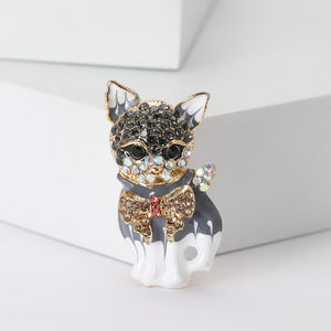 Gray and White Enamel Cat Brooch with a Rhinestone Bow, Alloy