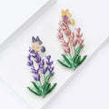 Butterfly on Flower Spike Enamel Brooch in Pink or Purple view 2