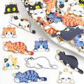 Sleeping Cat Enamel Charms in Ten Coat Patterns and Two Tones view 1
