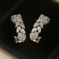 Crystal Leaf Climber Huggie Earrings in Silver Tone view 1