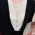 Silver Tone Lariat Necklace with Pearl and Crystal Rings view 3