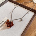 Silver Tone Chain Necklace With Brown Grape Cluster Pendant view 1