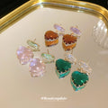 Faceted Heart Drop Earrings in Emerald Green and Amber Brown view 3