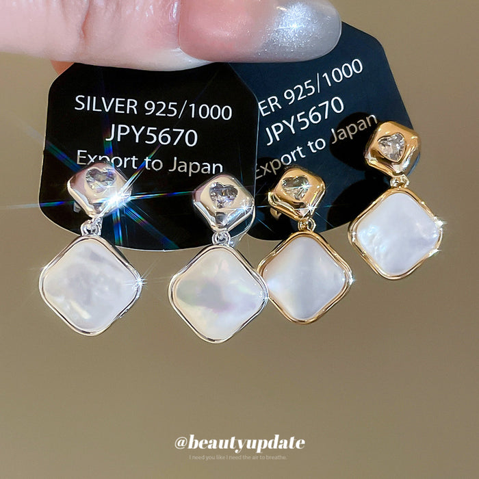Gold Tone Diamond White Shell Look Drop Clip On Earrings