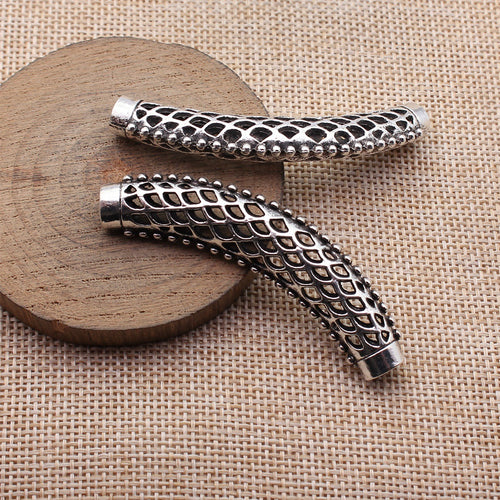 Open Diamond Lattice Curved Tube Connector displayed on a natural textured background