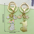 Cat Charm Keychains Featuring White Cat Across 35 Pictured Variations view 8