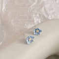 Translucent Blue Five Petal Flower And Pearl Center Stud Earrings view 1