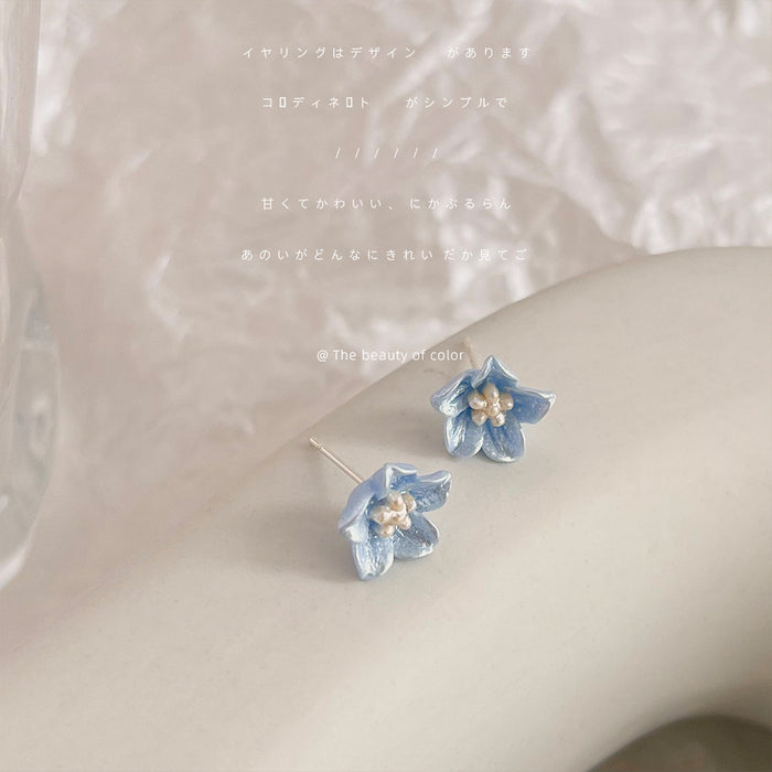 Translucent Blue Five Petal Flower And Pearl Center Stud Earrings