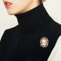 Cameo Rose Frame Brooch With Polished Metal And Sculpted Decorative Details view 2