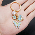 Three-Color Heart Pearl Rose and Butterfly Enamel Keychain Collection view 4