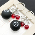 Black Eight Ball Star and Cherry Metal Keychain Set view 1
