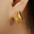Gold Steel Twin Curve Stud Earrings Beaded Center Bar view 3