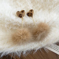 Brown Heart Stud Earrings With Soft Pom Pom Drops For Distinctive Statement Styling view 6