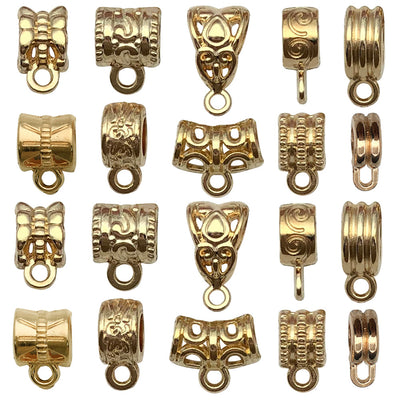 Gold-tone assorted shape charms arranged on a light background