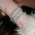 Three Pale Blue Crystal Bracelets With Oval Heart Or Mixed Centers view 3