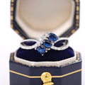 Three Blue Oval Stone Crisscross Ring In Polished Silver Tone view 2