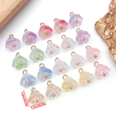 Front product photo of translucent lily of the valley glass charm showing the pictured design arrangement