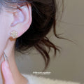 Gold Tone Floral Cluster Stud Earrings with Peach Pearl Beads view 3