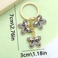 Butterfly Charm Keychains Featuring Black Trio Across 31 Pictured Variations view 2