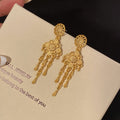 Gold Filigree Medallion Multi Chain Tassel Earrings view 4
