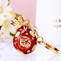 Jeweled Fortune Bag Keychain With Gold Tone Leaf Top view 3