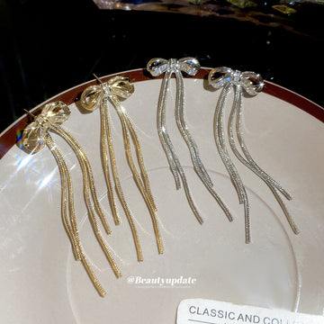 Crystal Bow Chain Tassel Earrings in Gold and Silver Tones