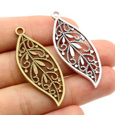 Filigree Leaf Pendants arranged in the pictured color and finish options