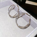 Twisted Double Hoop Earrings in Gold and Silver Tones view 7