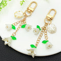 White Bell Flower Shell and Leaf Clasp Keychains with Metal Hardware view 2